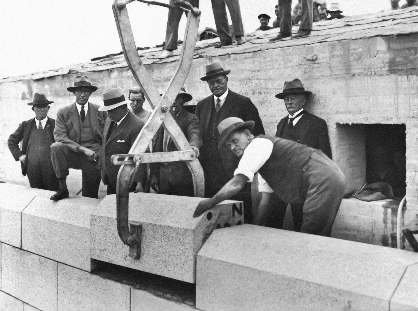 a group of men standing next to each other